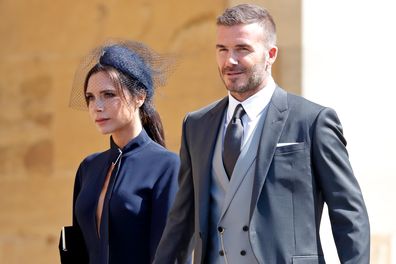 Victoria Beckham and David Beckham attend the wedding of Prince Harry to Ms Meghan Markle at St George's Chapel, Windsor Castle on May 19, 2018 in Windsor, England. 