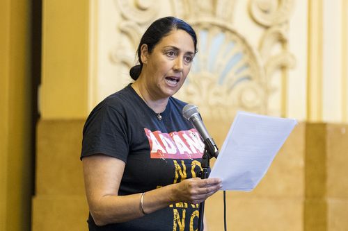 The Greens' Alex Bhathal addresses the audience during a Batman candidates forum at the Northcote Town Hall, in Melbourne, Australia, Tuesday, March 6, 2018. (AAP Image/Daniel Pockett)