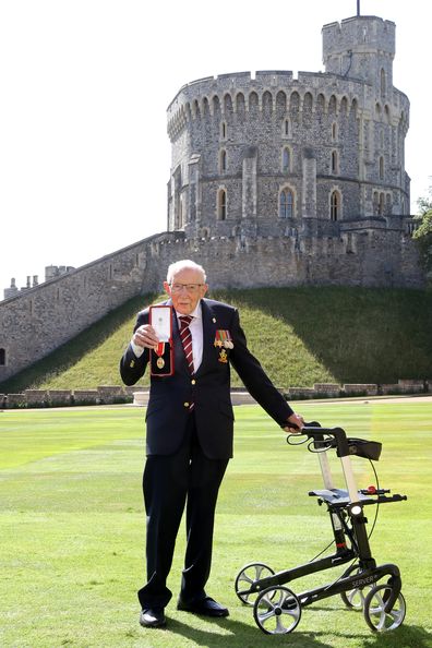 Captain Sir Thomas Moore poses after being awarded with the insignia of Knight Bachelor by Queen Elizabeth II at Windsor Castle on July 17, 2020 in Windsor, England. (Photo by Chris Jackson/Getty Images)