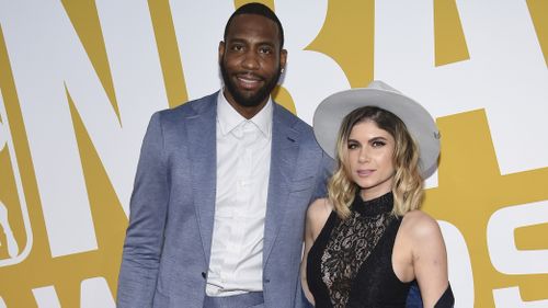 Rasual Butler and his wife Leah LaBelle in 2017. (AAP)