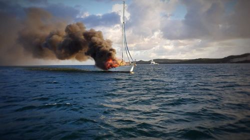 News Queensland yacht fire Moreton Island Brisbane news Australia