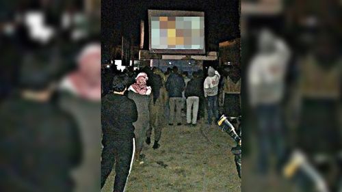 Yusuf Yusuf joined a crowd in Raqqa to watch a public screening of the death of Jordanian pilot Moaz al-Kasasbeh. (Facebook)