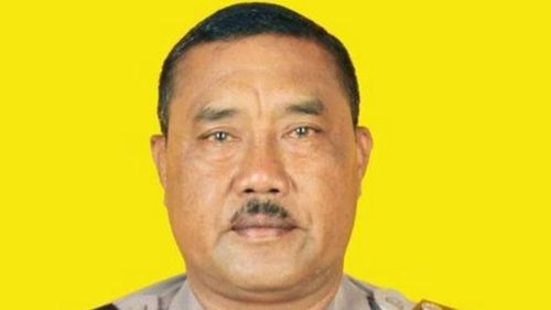 Police officer Wayan Sudarsa was found dead on Kuta Beach last August. (Supplied)