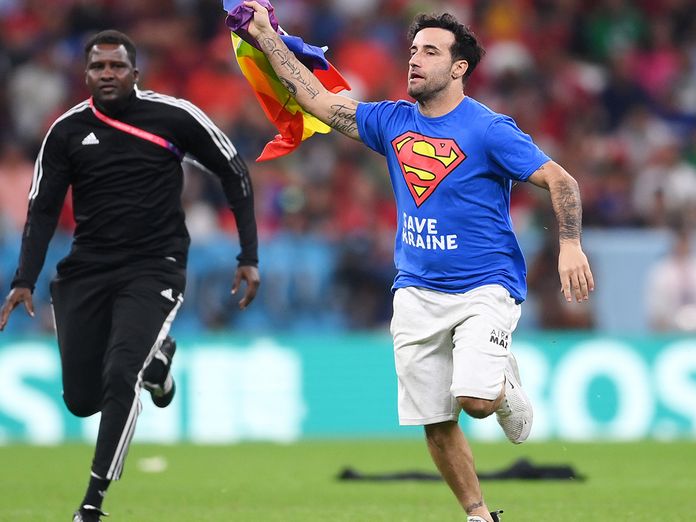 World Cup 2022: Protester runs onto pitch with rainbow flag