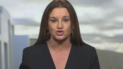 Jacqui Lambie protests on Remembrance Day.