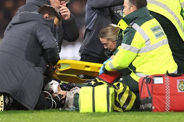 Tom Lockyer of Luton Town receives emergency attention after collapsing during the Premier League match between AFC Bournemouth and Luton Town at Vitality Stadium on December 16, 2023 in Bournemouth, England. (Photo by Warren Little/Getty Images)