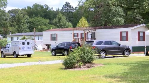 A kidnapped girl's escape in Alabama has led to the discovery of two decomposing bodies and the arrest of a man now facing murder and kidnapping charges, authorities said.