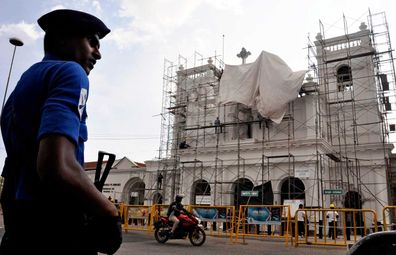 A military officer patrols outside the bombed St Anthony's Church, currently under reconstruction in Colombo, Sri Lanka.