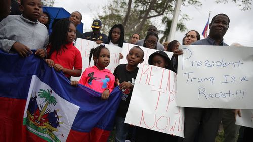 People in Miami, Florida, gathered to protest Trump's comments about "s---hole countries" that reportedly included Haiti, and to commemorate the eighth anniversary of the Haiti earthquake. Photo: Getty Images