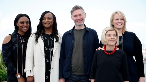 'Whitney' producers Nicole David and Lisa Erspamer, director Kevin Macdonald, producers Pat Houston and Rayah Houston pose for photos at the 71st annual Cannes Film Festival. Picture: EPA