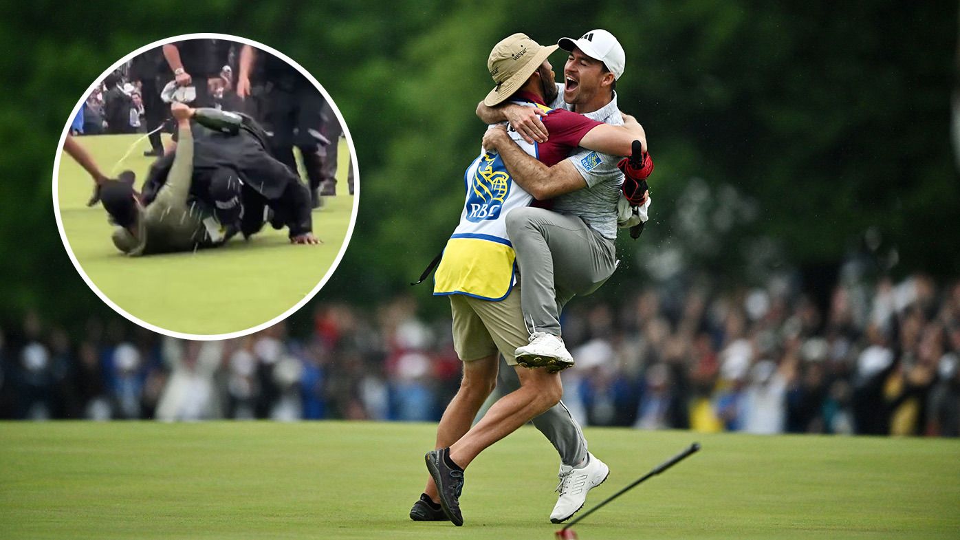 Nick Taylor celebrating with his caddie, as friend Adam Hadwin is tackled by security.