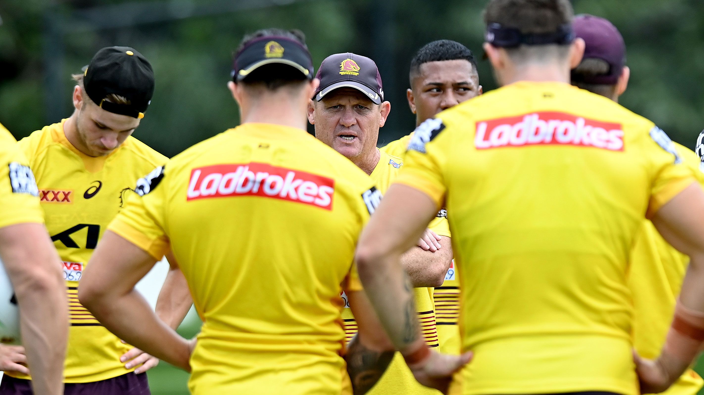 Coach Kevin Walters talks to his players during a Brisbane Broncos training session.