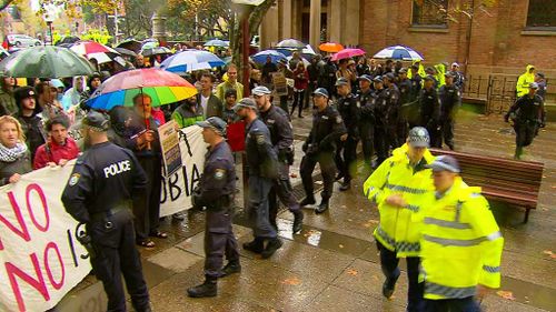 Police monitoring protesters in Sydney. (9NEWS)