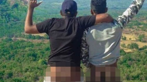 Sri Lankan men arrested for bare bums photo