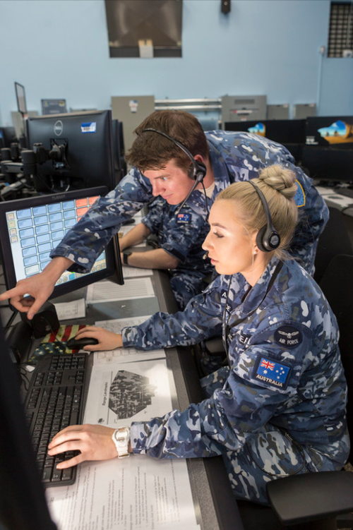 Flight Lieutenat Michael Pickering, an Air Warfare Instructor, and Flying Officer Stephanie Geaney, an Air Battle Manager. The RAAF ran the control and reporting centre for the whole exercise. (9NEWS)