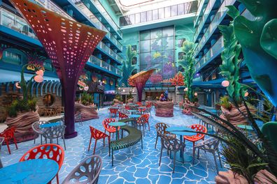 Families can shop and dine at Disney Discovery Reef. This ethereal and ever-changing retreat on the Disney Adventure features favorite aquatic characters and nautical stories from Disney, including "The Little Mermaid" and "Lilo & Stitch," as well as Pixar films "Finding Nemo" and "Luca." (Kent Phillips, photographer)