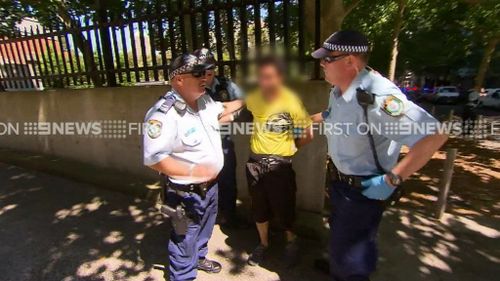 The man was arrested outside the Surry Hills police station. (9NEWS)