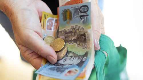 GEN23, Generic, cash payments, shopping, cost of living,  wages, withdrawal, atm, armaguard, groceries, in Sydney on April 1, 2024. 