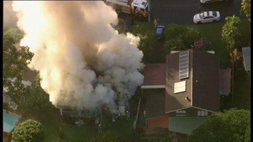 Fire crews arrived to find the home at Ferny Hills completely engulfed in flames. (9NEWS)