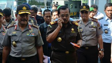 Indonesian Attorney General, HM Prasetyo (2nd right) and Indonesian National Police Chief, General Badrodin Haiti during a visit to Nusakambangan Island. (AAP)