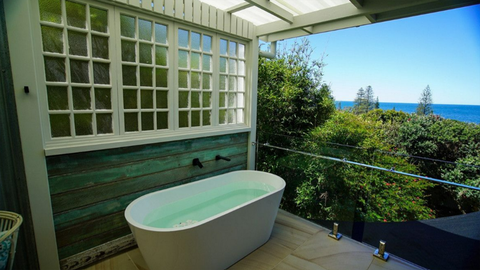 Homes on the market with bath tubs on the balconies.