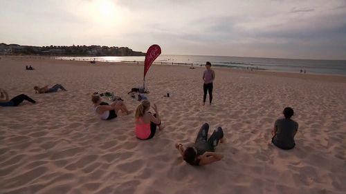 Early morning exercise at Bondi as temperatures climbed just after dawn.