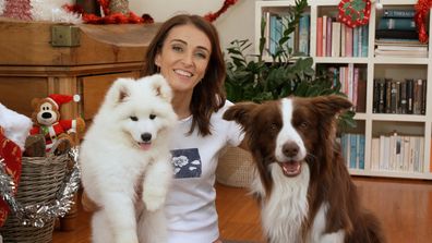 Dr Katrina Warren with two dogs