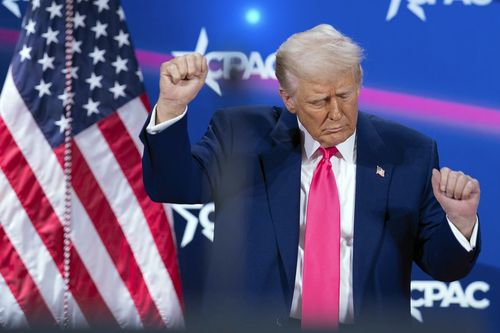 President Donald Trump dances after speaking at the Conservative Political Action Conference, CPAC, at the Gaylord National Resort & Convention Center, Saturday, Feb. 22, 2025, in Oxon Hill, Md. (AP Photo/Jose Luis Magana)