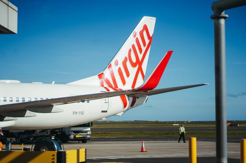 GENERICS: Virgin Australia airplanes at Sydney Domestic Airport, Friday 25th of August 2023. Photo: Dion Georgopoulos / The Sydney Morning Herald