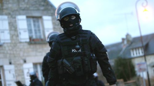 French police patrol Longpont and Villers Cotterets, north-east of Paris, for brothers  Cherif Kouachi, 32, and Said Kouachi, 34, who are suspected of carrying out a violent attack on a satirical French magazine that left 12 people dead. (AAP)