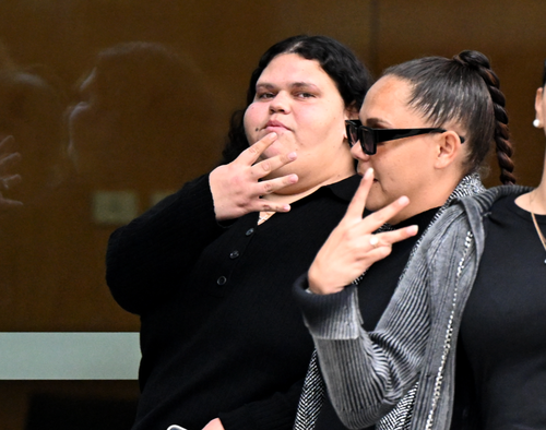 Jamie Lee Brown (left) is seen outside the Brisbane Supreme Court in Brisbane on Tuesday
