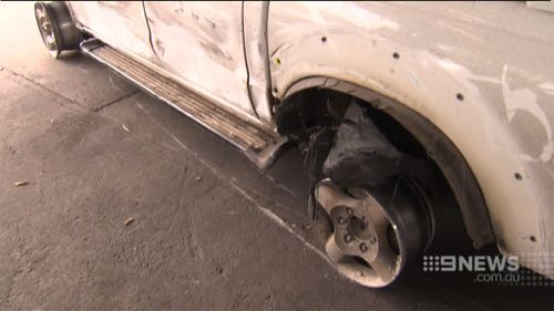 Police allege the group continued to flee pursuit, despite hitting road spikes. (9NEWS)