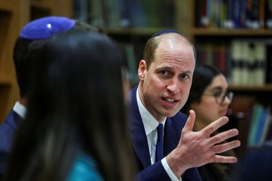 Prince William, Prince of Wales sits with young people, affected by anti-Semitism, together with Holocaust Educational Trust ambassadors during a visit to the Western Marble Arch Synagogue on February 29, 2024 in London