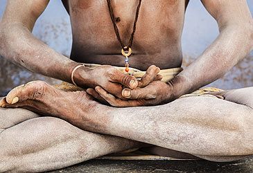 What does the term "yoga" mean in Vedic Sanskrit?