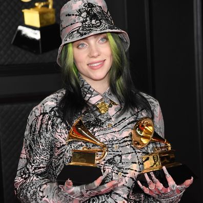 Billie Eilish, winner of Record of the Year for 'Everything I Wanted' and Best Song Written For Visual Media for "No Time To Die", poses in the media room during the 63rd Annual GRAMMY Awards.