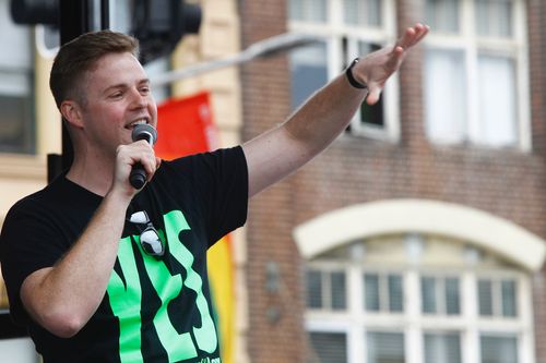 Comedian Tom Ballard performs at a street party in support of marriage equality in Darlinghurst, Sydney.