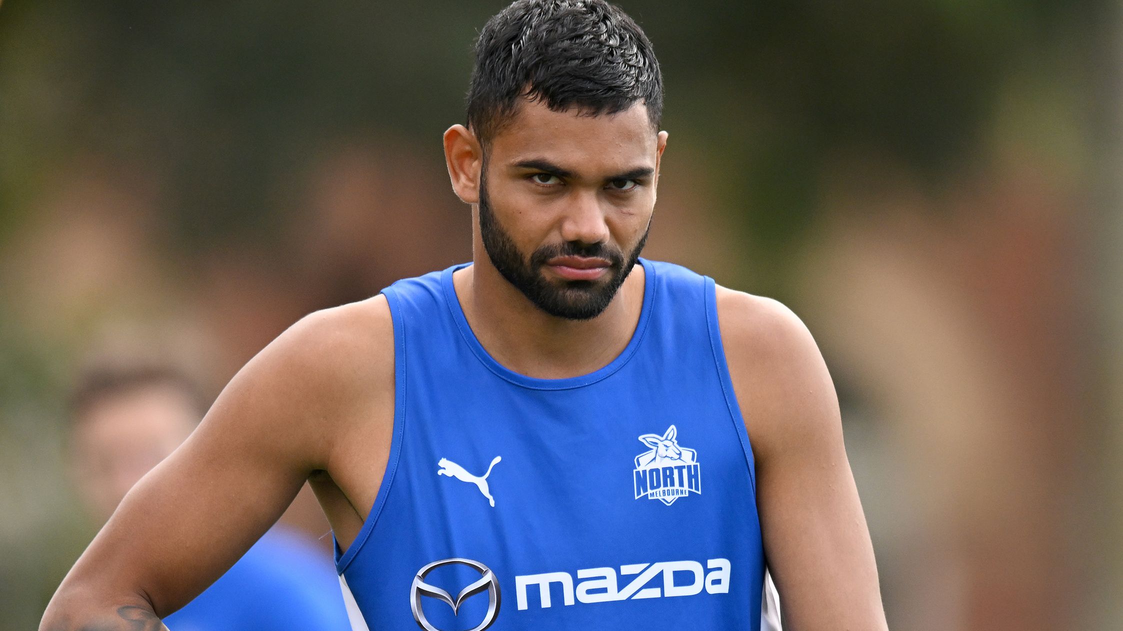 MELBOURNE, AUSTRALIA - MARCH 18: Tarryn Thomas of the Kangaroos warms up ahead of the VFL Practice Match between North Melbourne and Williamstown at Arden Street Ground on March 18, 2023 in Melbourne, Australia. (Photo by Morgan Hancock/Getty Images)