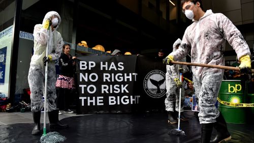 Protesters stage mock oil spill outside BP’s Melbourne headquarters 