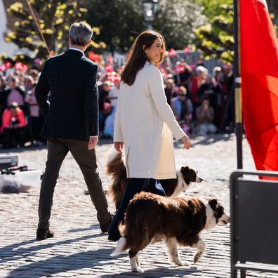 FREDENSBORG, DENMARK - MAY 5: King Frederik X of Denmark and Queen Mary of Denmark are welcomed by the public at Fredensborg Castle on May 5, 2025 in Fredensborg, Denmark with their dogs Grace and Coco.