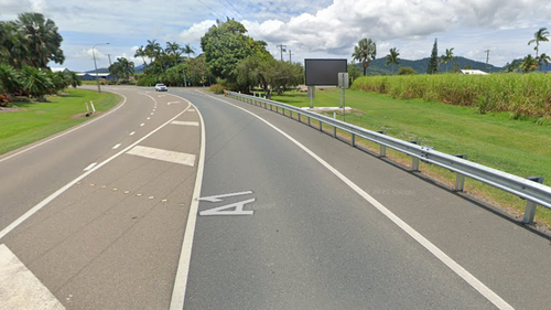 A man has died after a ute collided with a truck on the Bruce Highway at Proserpine in Queensland.