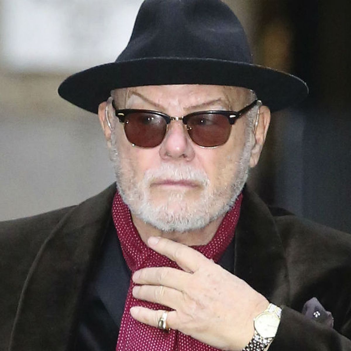 Former pop star Gary Glitter sobs in court over child porn case