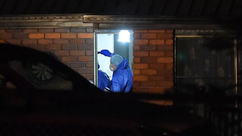  Police forensic investigators enter the house in Biddeston. (AAP)