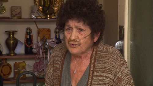 Three men wearing balaclavas smashed through a window of a 74-year-old's home, demanding money and injuring her arm. Picture: 9NEWS