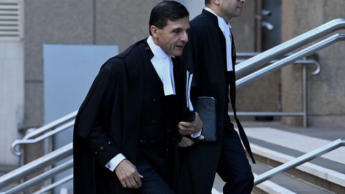 Arthur Moses (left) the Barrister for Ben Roberts-Smith arrives at the NSW Supreme Courts this morning in Sydney. 18th July, 2022. Photo: Kate Geraghty