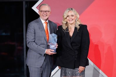 Body-image activist Taryn Brumfitt receives the 2023 Australian of the Year award from Prime Minister Anthony Albanese during the 2023 Australian of the Year Awards at the National Arboretum on January 25, 2023 in Canberra, Australia 