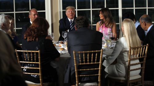 President Donald Trump having dinner at Bedminster Golf Club in New Jersey. (AAP)