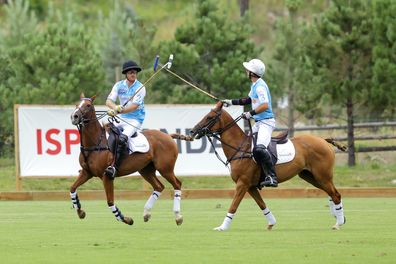 (L-R) Prince Harry, Duke of Sussex and Sentebale Ambassador Nacho Figueras play polo during the Sentebale ISPS Handa Polo Cup 2022 on August 25, 2022 in Aspen, Colorado 