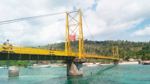 The "Yellow Bridge" connected Lemongan and Ceningan Islands near Bali. (www.tripadvisor.com/angky)