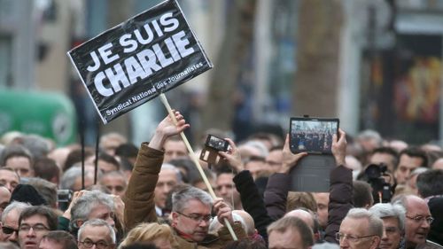 Thousands of people gather at Republique square in Paris, France. (AAP)