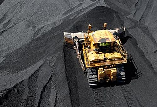 Bulldozer shifting coal (AAP)